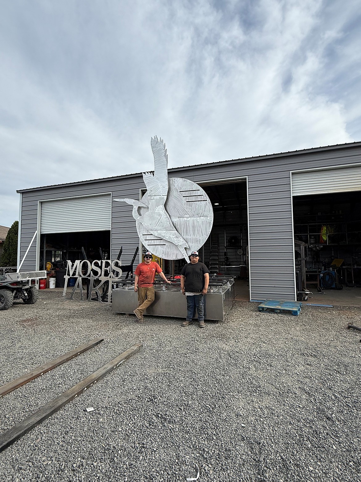 The crew from Miner Services shows off the mostly-completed fountain.