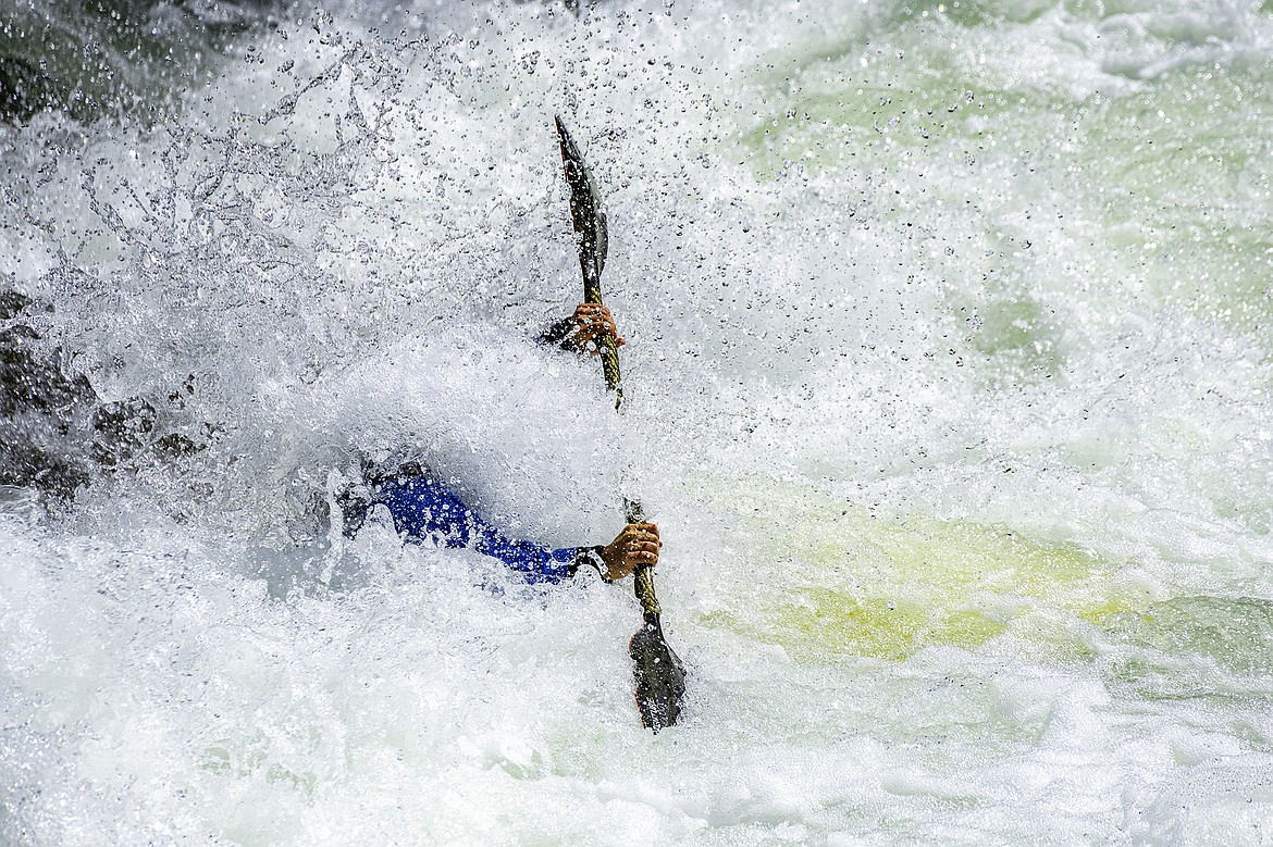 Cory Luoma gets a face full of the Wild Mile during the Bigfork Whitewater Festival. Seth Anderson Photo