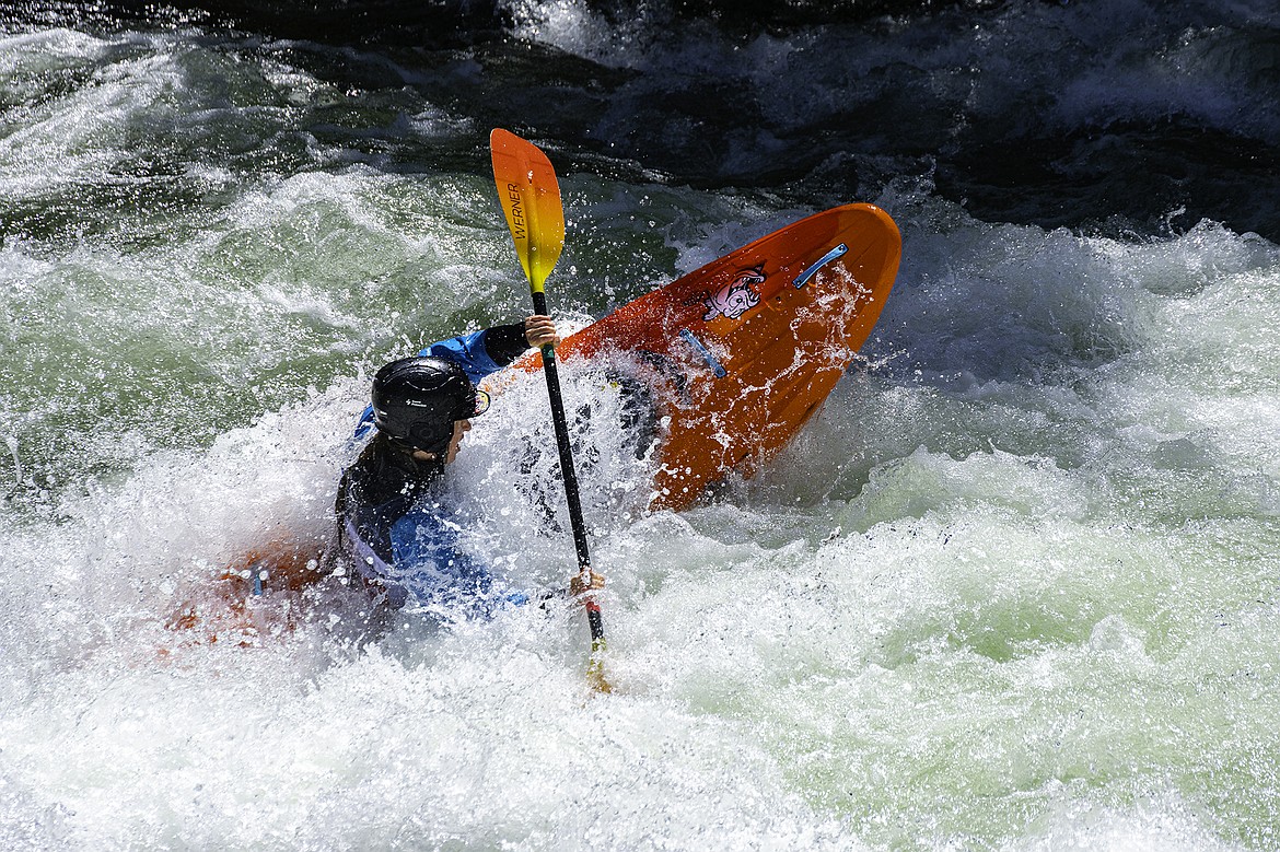 Dj Stoneman drops the big rock during the Bigfork Whitewater festival on the Wild Mile. Seth Anderson Photo.