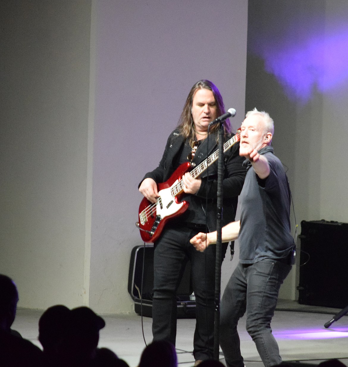 Bass player Jack Daley, left, and singer Chris Barron of Spin Doctors perform at the Moses Lake Spring Festival Friday.