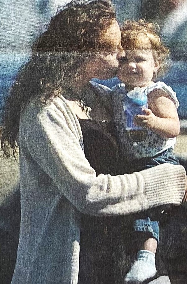 Amber Peace held Maria, her 15-month-old daughter, in July 2005 after visiting Shasta Groene at Kootenai Medical Center.