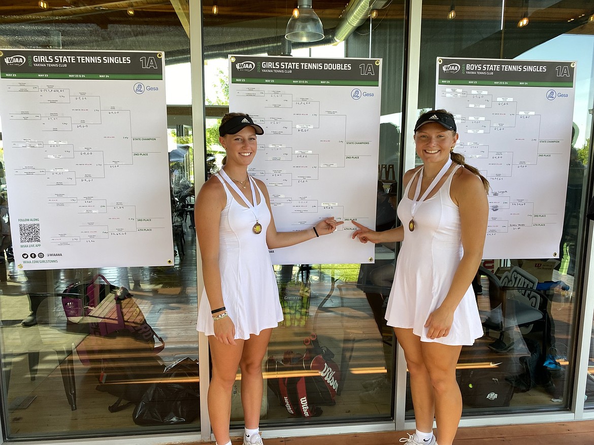 Campbelle Anderson and Madi Christensen with their medals after finishing third at the 2025 1A state tournament. The two seniors plan to continue their tennis careers in whatever way possible until they can play at the collegiate level.