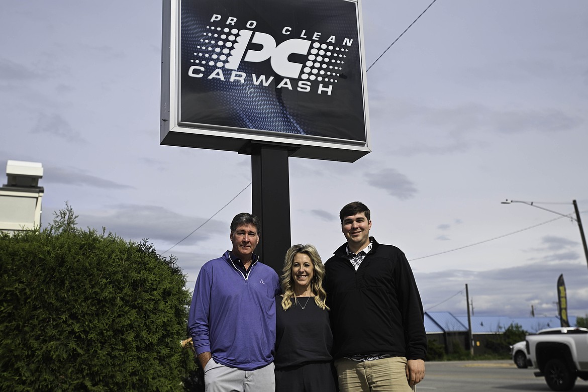 From left to right, Mark, Shelli and Austin Hilde, owners of Pro Clean Carwash in Kalispell, stand in front of the wash on May 22, 2025. (Kate Heston/Daily Inter Lake)