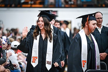 Graduates file into the gymnasium at Flathead High School's class of 2025 graduation ceremony on Friday, May 30. (Casey Kreider/Daily Inter Lake)