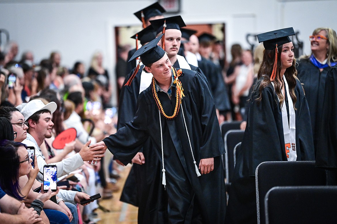Graduates file into the gymnasium at Flathead High School's class of 2025 graduation ceremony on Friday, May 30. (Casey Kreider/Daily Inter Lake)