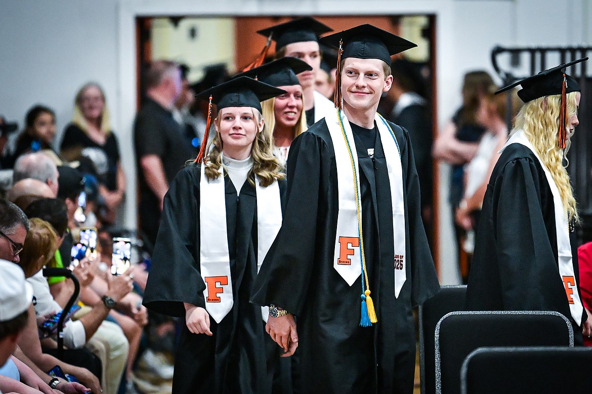 Graduates file into the gymnasium at Flathead High School's class of 2025 graduation ceremony on Friday, May 30. (Casey Kreider/Daily Inter Lake)