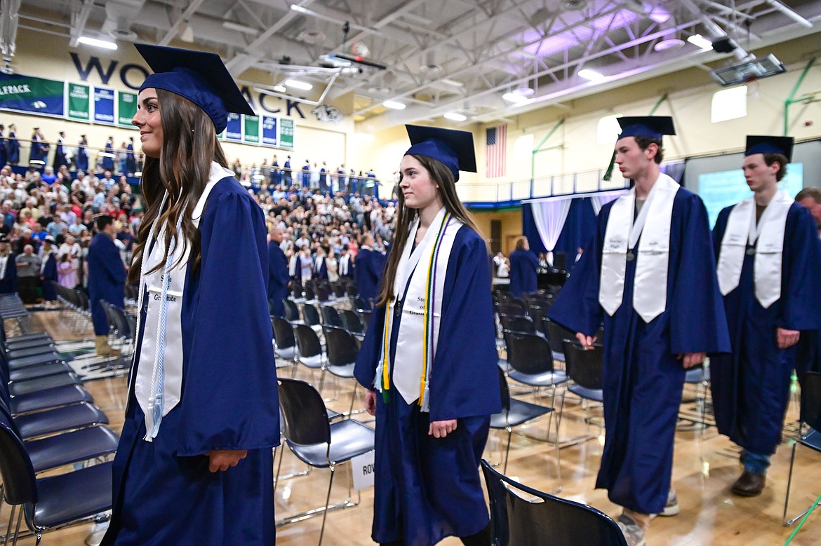 Graduates file into the gymnasium at Glacier High School's class of 2025 graduation ceremony on Saturday, May 31. (Casey Kreider/Daily Inter Lake)