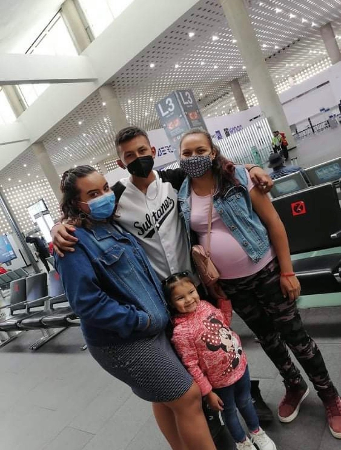 Jose Cabrera gathers with family members for a photo. Cabrera lives with family in Othello while other relatives live in Mexico City.