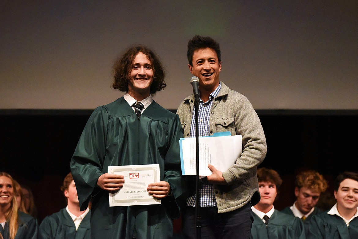 Jackson Schindler is presented the Margaret Fellows Memorial and Jane Fellows Scholarship by Mikey Wynn. Jane Fellows name was recently added to the scholarship for her role with Whitefish Theatre Company. (Kelsey Evans/Whitefish Pilot)