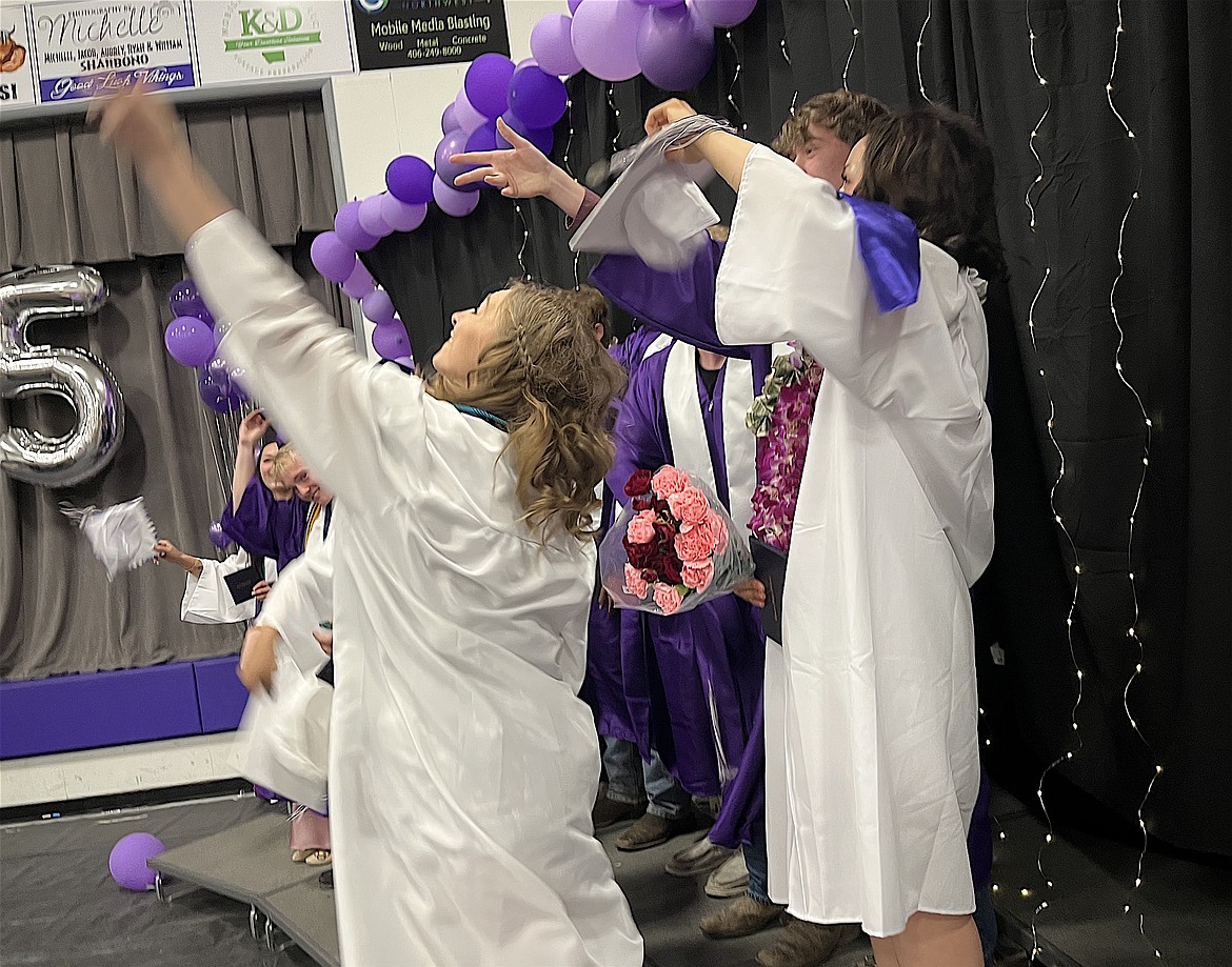 Liberation! The 14 graduates of Charlo High School toss mortarboards before heading into the world with fresh ideas and ambitions. (Kristi Niemeyer/Leader)