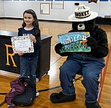 Smokey Bear visits PRE poster contest winners
