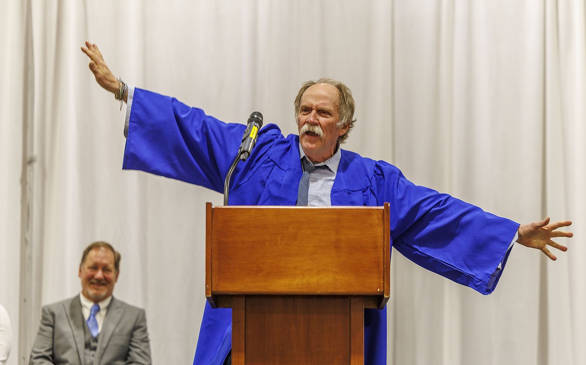 Bigfork High School instructor Hans Bodenhamer delivers a rousing commencement address at the 2025 graduation ceremonies. His last, as he is retiriing at schools end this year.