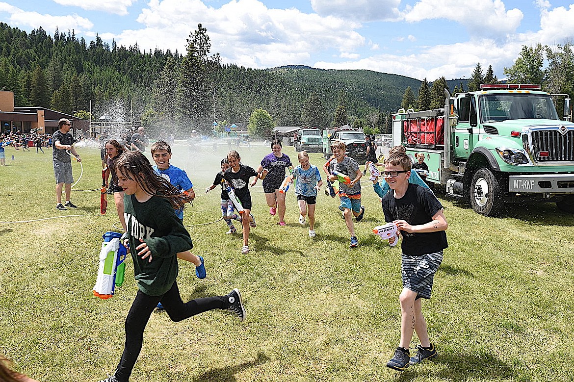 Libby Elementary School's annual water fight tradition continued Wednesday, June 4, 2025, with Kootenai National Forest fire crews providing the water tanks and some good-hearted resistance. (Scott Shindledecker/The Western News)