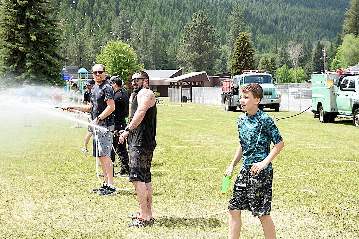 Libby Elementary School's annual water fight tradition continued Wednesday, June 4, 2025, with Kootenai National Forest fire crews providing the water tanks and some good-hearted resistance. (Scott Shindledecker/The Western News)