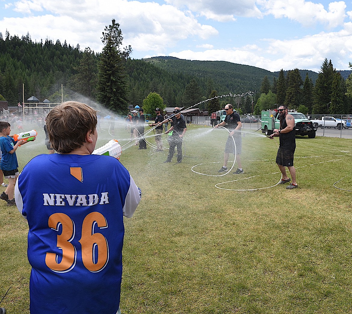 Libby Elementary School's annual water fight tradition continued Wednesday, June 4, 2025, with Kootenai National Forest fire crews providing the water tanks and some good-hearted resistance. (Scott Shindledecker/The Western News)