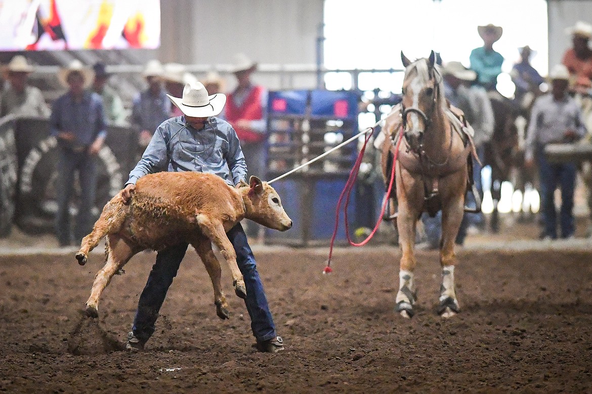 Ryker Peterson, from Livingston, competes in the tie down roping event at the Montana High School Rodeo Association Finals at Majestic Valley Arena on Thursday, June 5. (Casey Kreider/Daily Inter Lake)