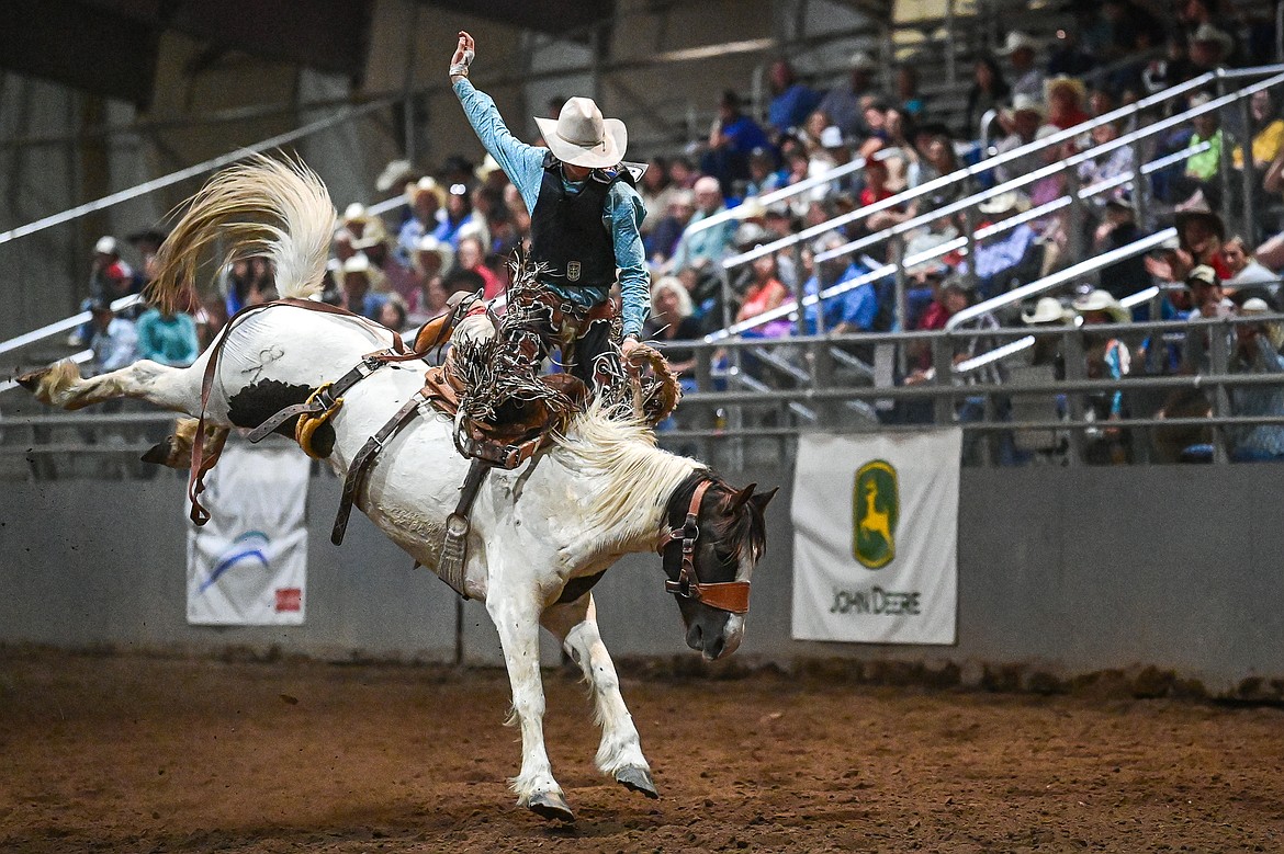 Colton Haase, from East Helena, competes in the saddle bronc riding event at the Montana High School Rodeo Association Finals at Majestic Valley Arena on Thursday, June 5. (Casey Kreider/Daily Inter Lake)
