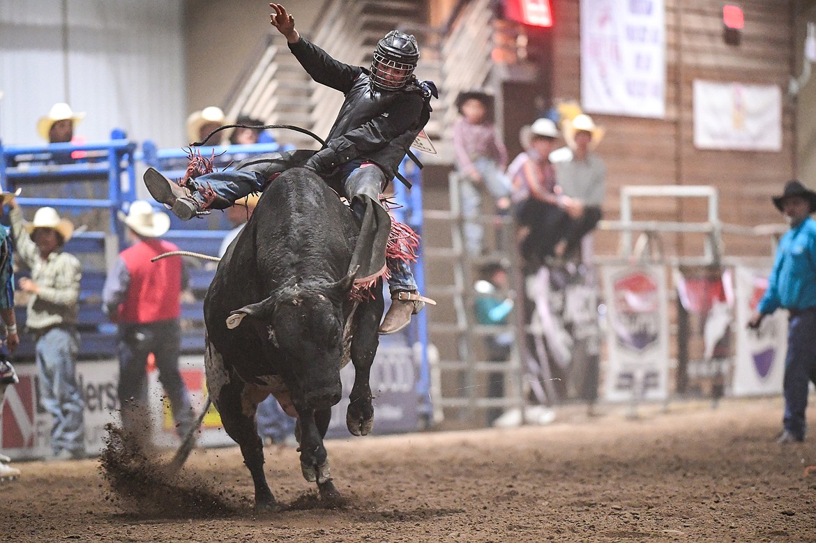Clay Koehler, from Ronan, competes in bull riding at the Montana High School Rodeo Association Finals at Majestic Valley Arena on Thursday, June 5. (Casey Kreider/Daily Inter Lake)