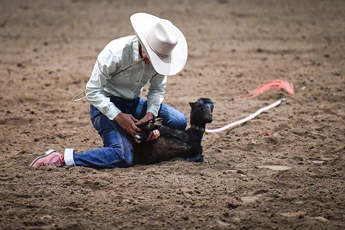 Anna Tretter, from Kila, competes in the goat tying event at the Montana High School Rodeo Association Finals at Majestic Valley Arena on Thursday, June 5. (Casey Kreider/Daily Inter Lake)