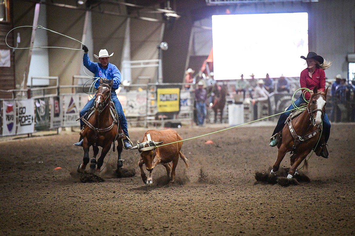 AJ and Aspen Swenson, from Huntley, compete in team roping at the Montana High School Rodeo Association Finals at Majestic Valley Arena on Thursday, June 5. (Casey Kreider/Daily Inter Lake)