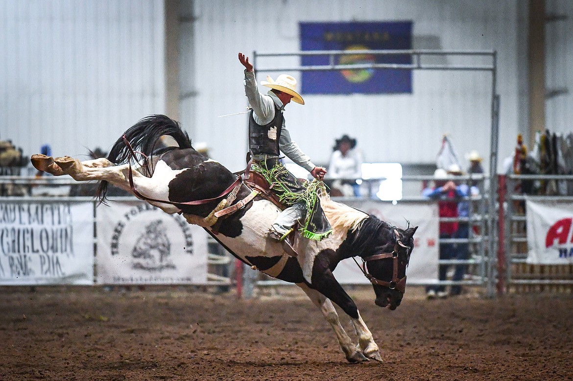 Levi Noyes, from Sarpy, competes in the saddle bronc riding event at the Montana High School Rodeo Association Finals at Majestic Valley Arena on Thursday, June 5. (Casey Kreider/Daily Inter Lake)