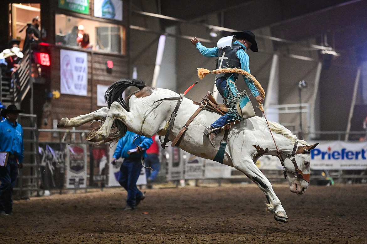 Kash Bouma, from Fairfield, competes in the saddle bronc riding event at the Montana High School Rodeo Association Finals at Majestic Valley Arena on Thursday, June 5. (Casey Kreider/Daily Inter Lake)