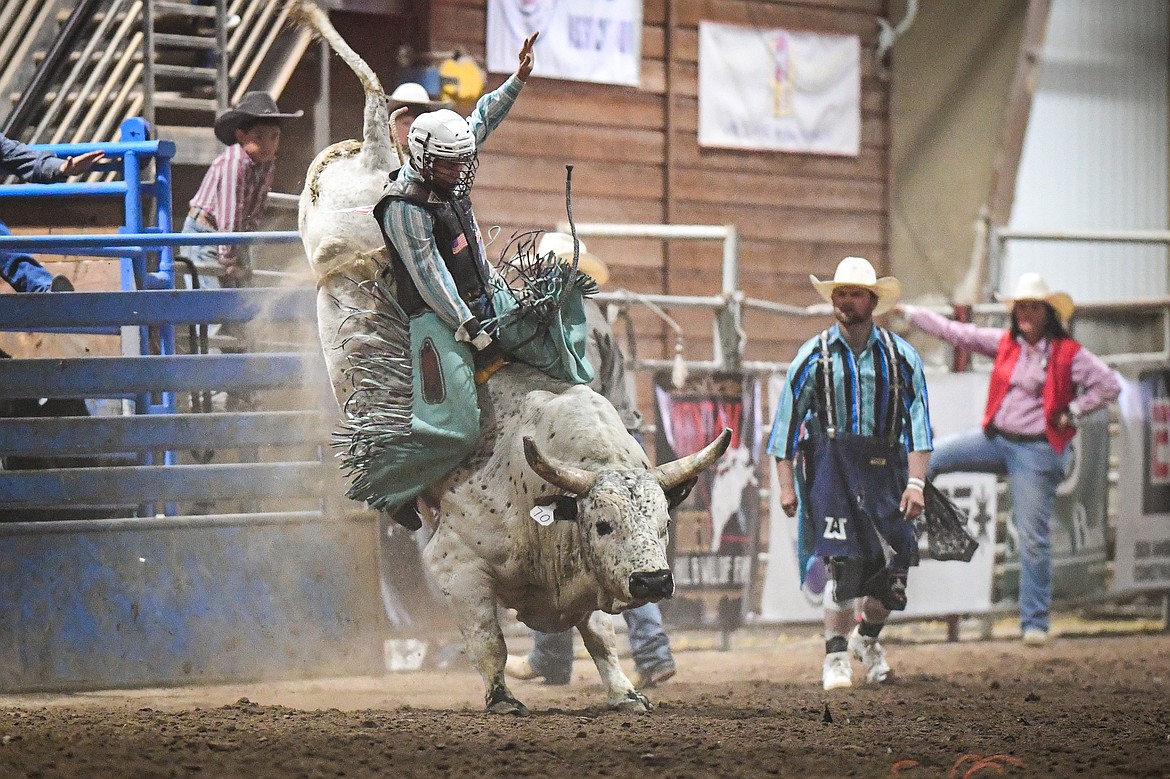 Rio Luger, from Busby, competes in bull riding at the Montana High School Rodeo Association Finals at Majestic Valley Arena on Thursday, June 5. (Casey Kreider/Daily Inter Lake)