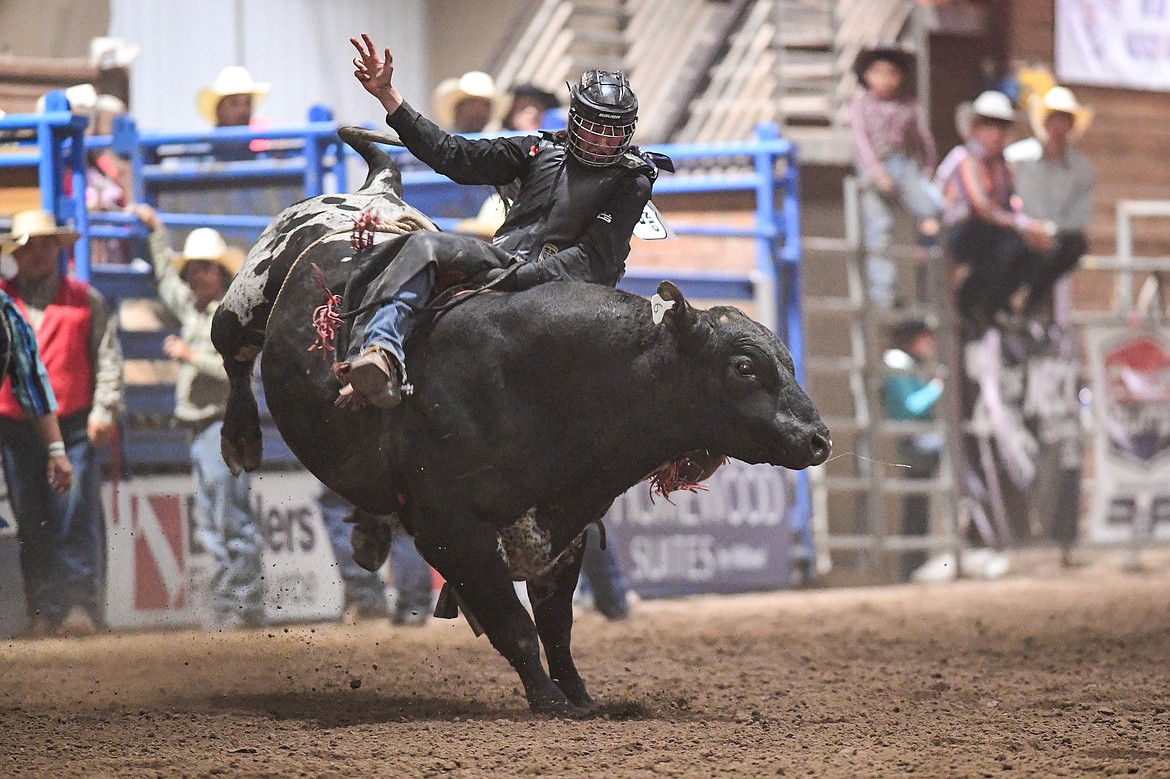 Clay Koehler, from Ronan, competes in bull riding at the Montana High School Rodeo Association Finals at Majestic Valley Arena on Thursday, June 5. (Casey Kreider/Daily Inter Lake)