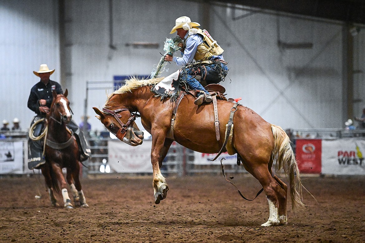 Koby Saylor, from Jordan, competes in the saddle bronc riding event at the Montana High School Rodeo Association Finals at Majestic Valley Arena on Thursday, June 5. (Casey Kreider/Daily Inter Lake)