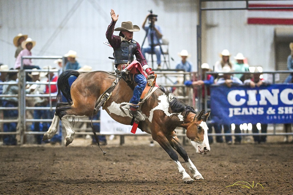 Wace Williams, from Browning, competes in the saddle bronc riding event at the Montana High School Rodeo Association Finals at Majestic Valley Arena on Thursday, June 5. (Casey Kreider/Daily Inter Lake)
