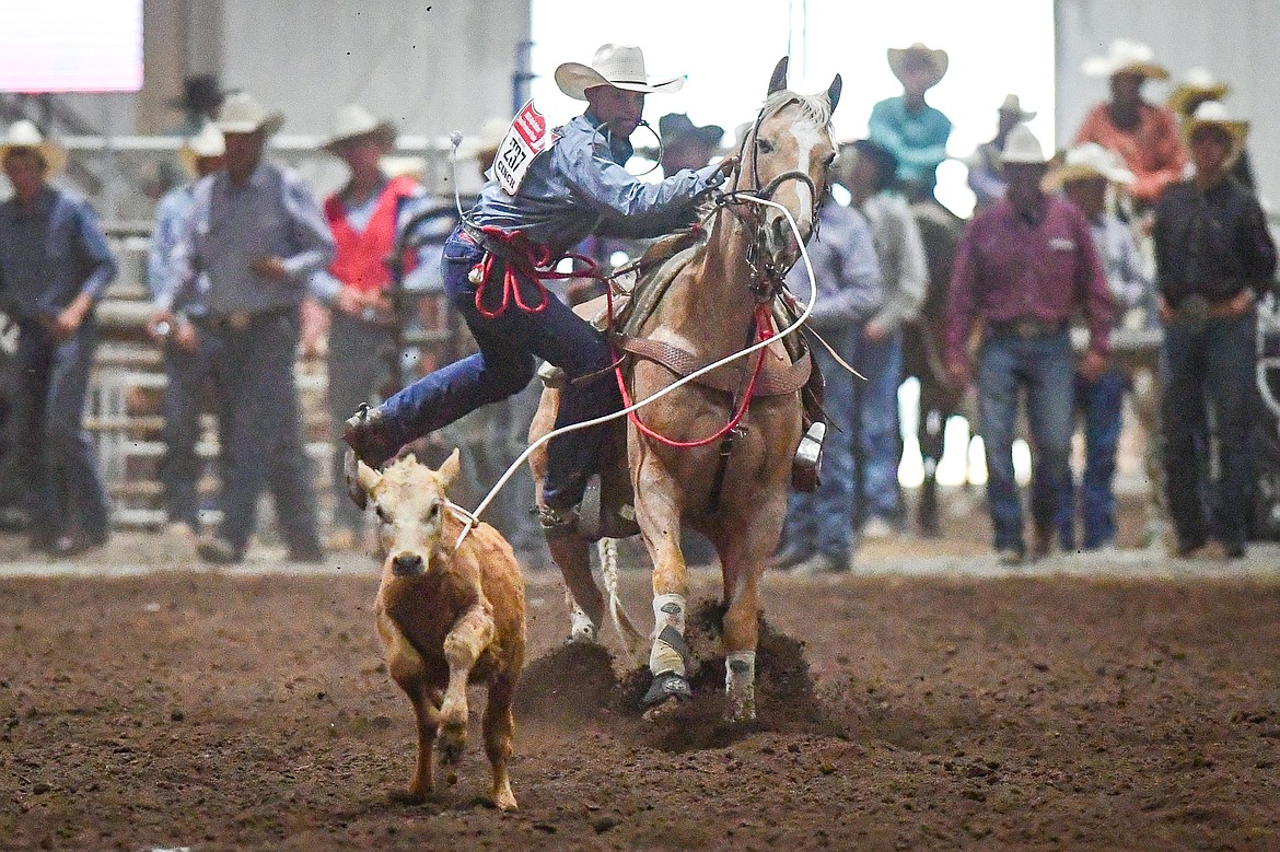 Ryker Peterson, from Livingston, competes in the tie down roping event at the Montana High School Rodeo Association Finals at Majestic Valley Arena on Thursday, June 5. (Casey Kreider/Daily Inter Lake)