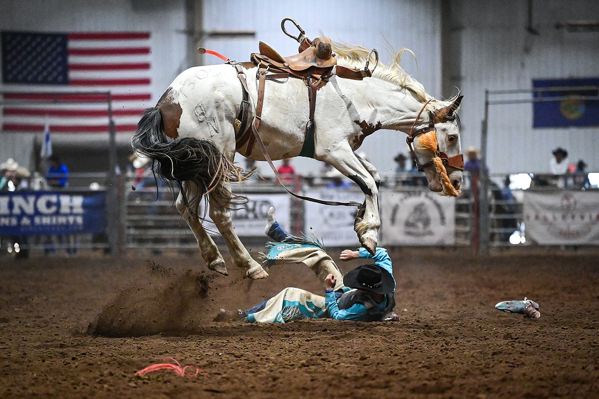 Kash Bouma, from Fairfield, is thrown from his horse in the saddle bronc riding event at the Montana High School Rodeo Association Finals at Majestic Valley Arena on Thursday, June 5. (Casey Kreider/Daily Inter Lake)