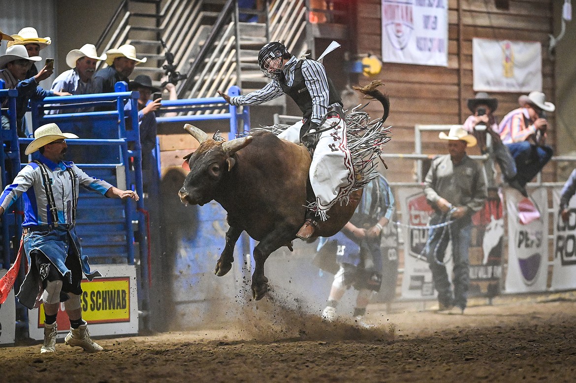 Kas Whiteman, from Browning, competes in bull riding at the Montana High School Rodeo Association Finals at Majestic Valley Arena on Thursday, June 5. (Casey Kreider/Daily Inter Lake)
