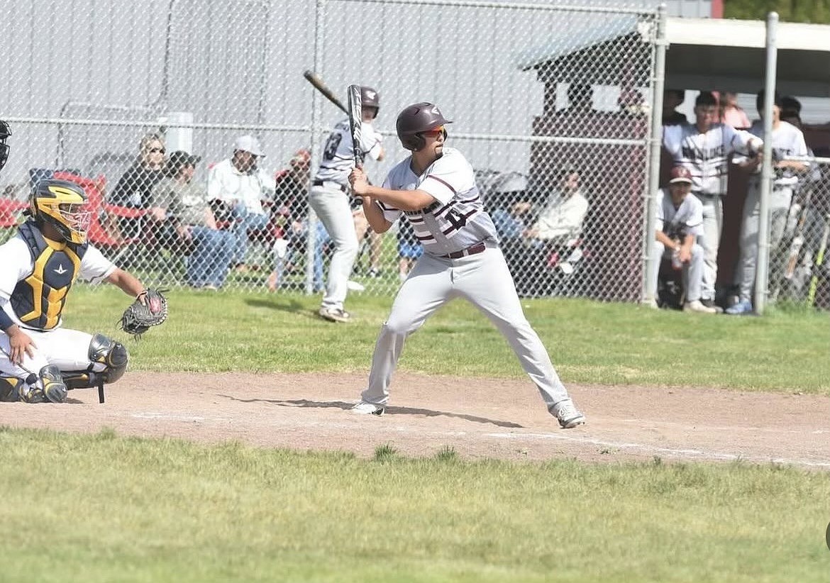 Warriors’ senior Andy Garcia batting in one of the games this season. Garcia is one of seven seniors that graduated from Wahluke High School this year.