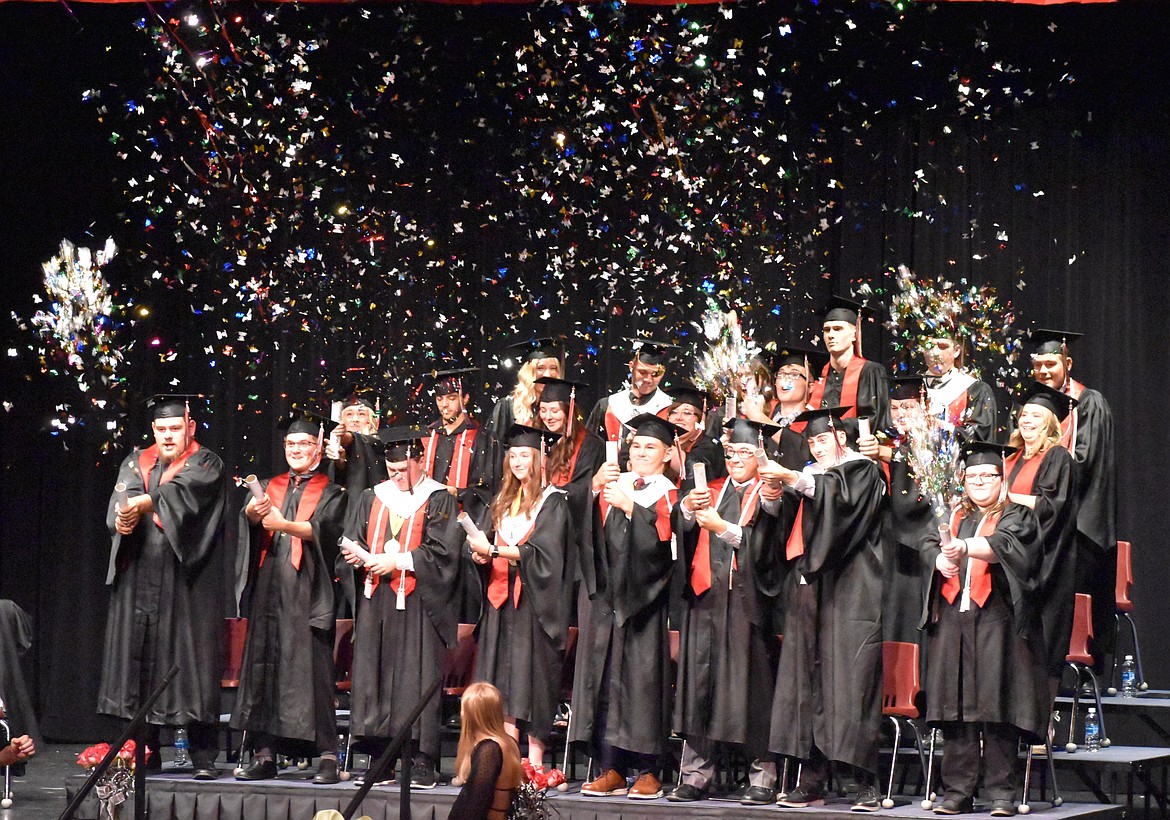 The Class of 2025 shoots off confetti in celebration of their graduation from Almira-Coulee- Hartline High School Saturday afternoon.