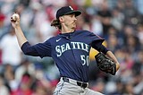Kyle Hendricks picks up career win No. 100 as Angels beat the Mariners 5-4