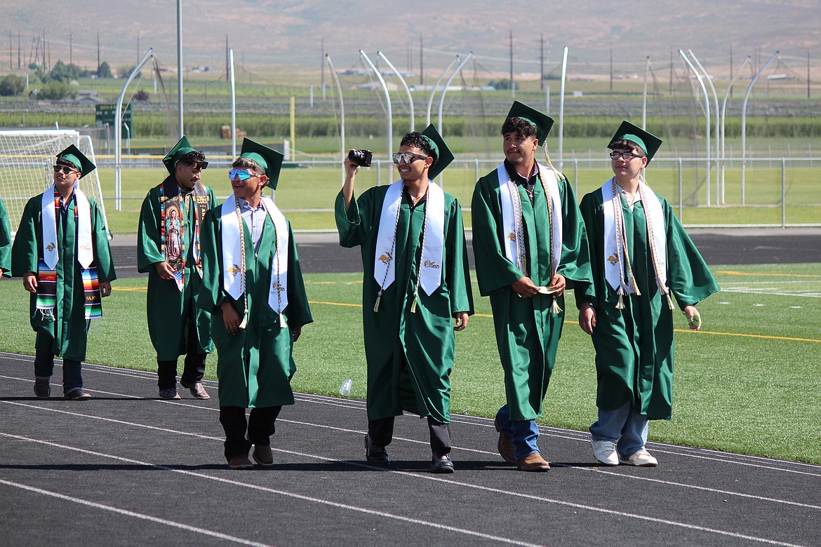 Members of the class of 2025 filmed their graduation walk at the ceremony Saturday at Quincy High School.