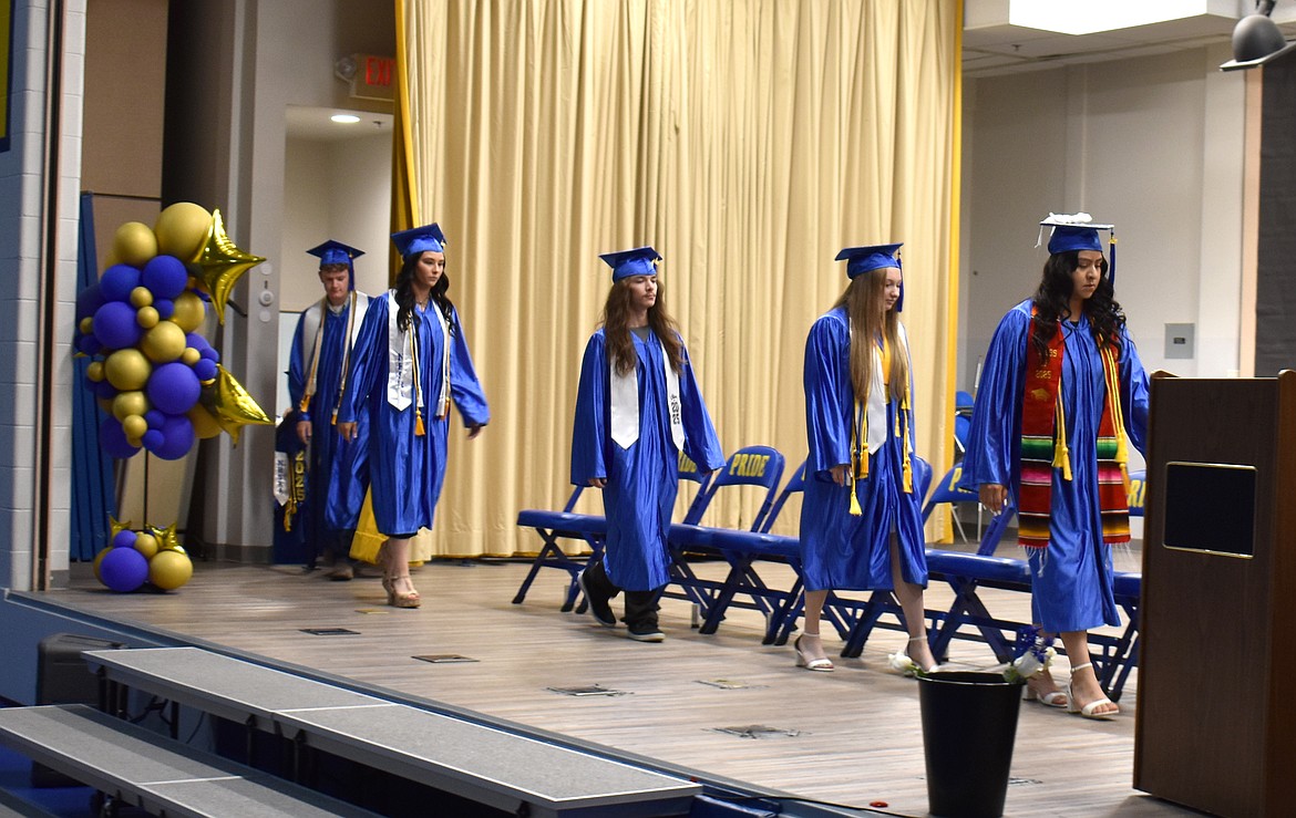 The Wilson Creek High School Class of 2025 files onto the stage at graduation May 31.