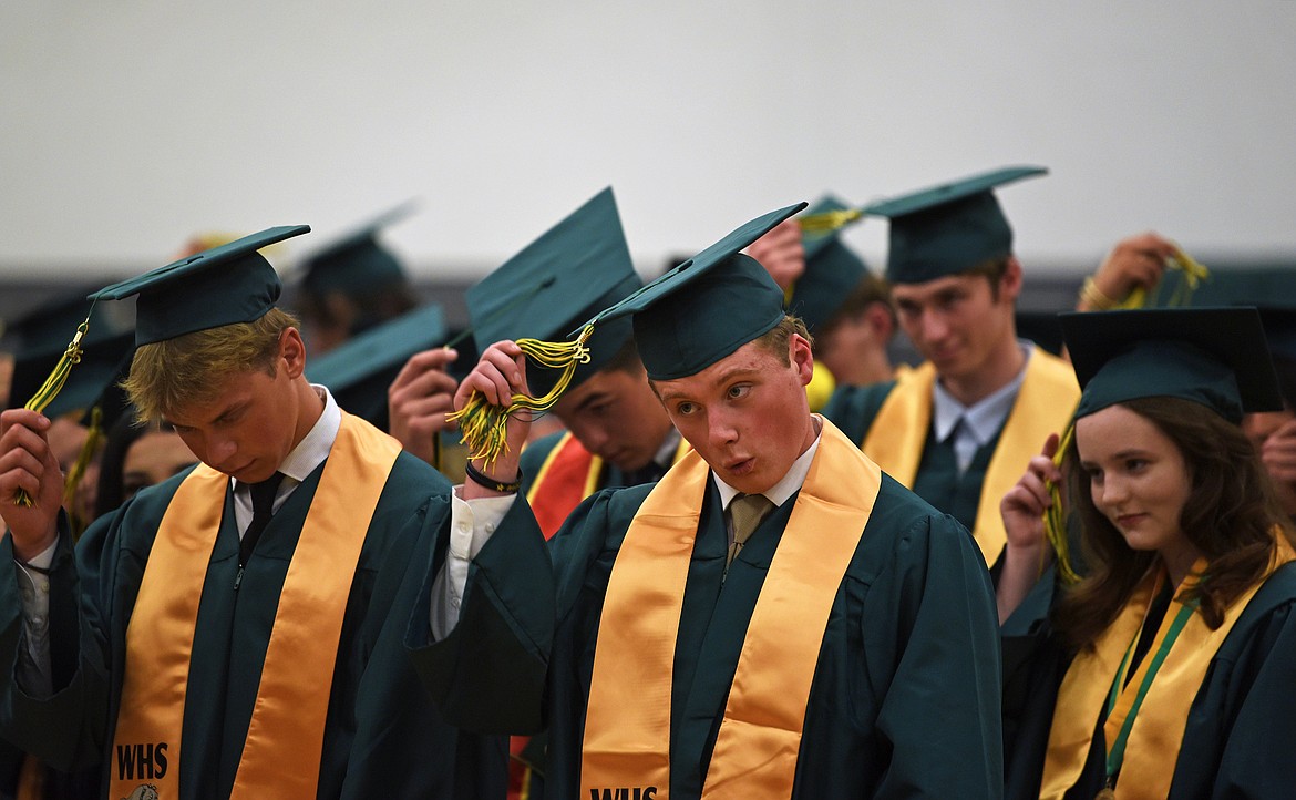 Moving the tassels at graduation. (Kelsey Evans/Whitefish Pilot)
