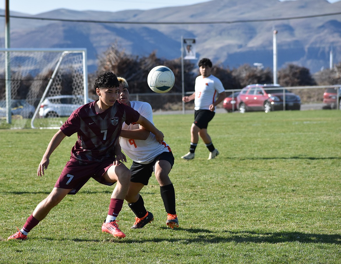 Diego Perez keeps the ball away from a Zillah player in a home game this season. This year the Warriors graduated nine seniors from the soccer team including Perez.