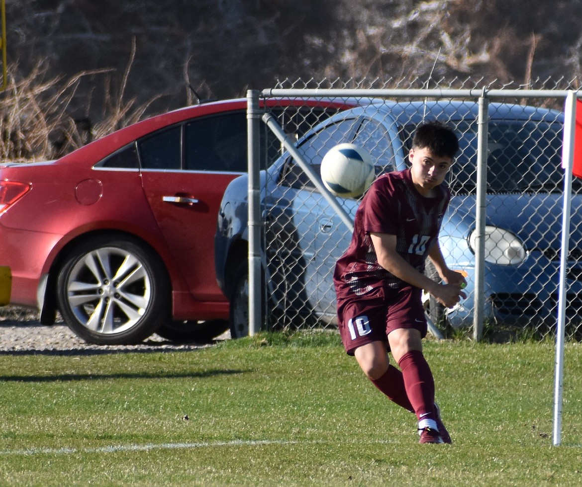 Warriors’ senior Alvaro Rodriguez kicks the ball back into play in one of their regular season games. The team was able to make the state tournament after winning the SCAC league title and finishing third in the district tournament.