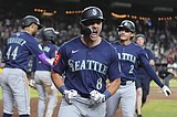Naylor hits grand slam in 11th and Diamondbacks recover to beat Mariners 8-4