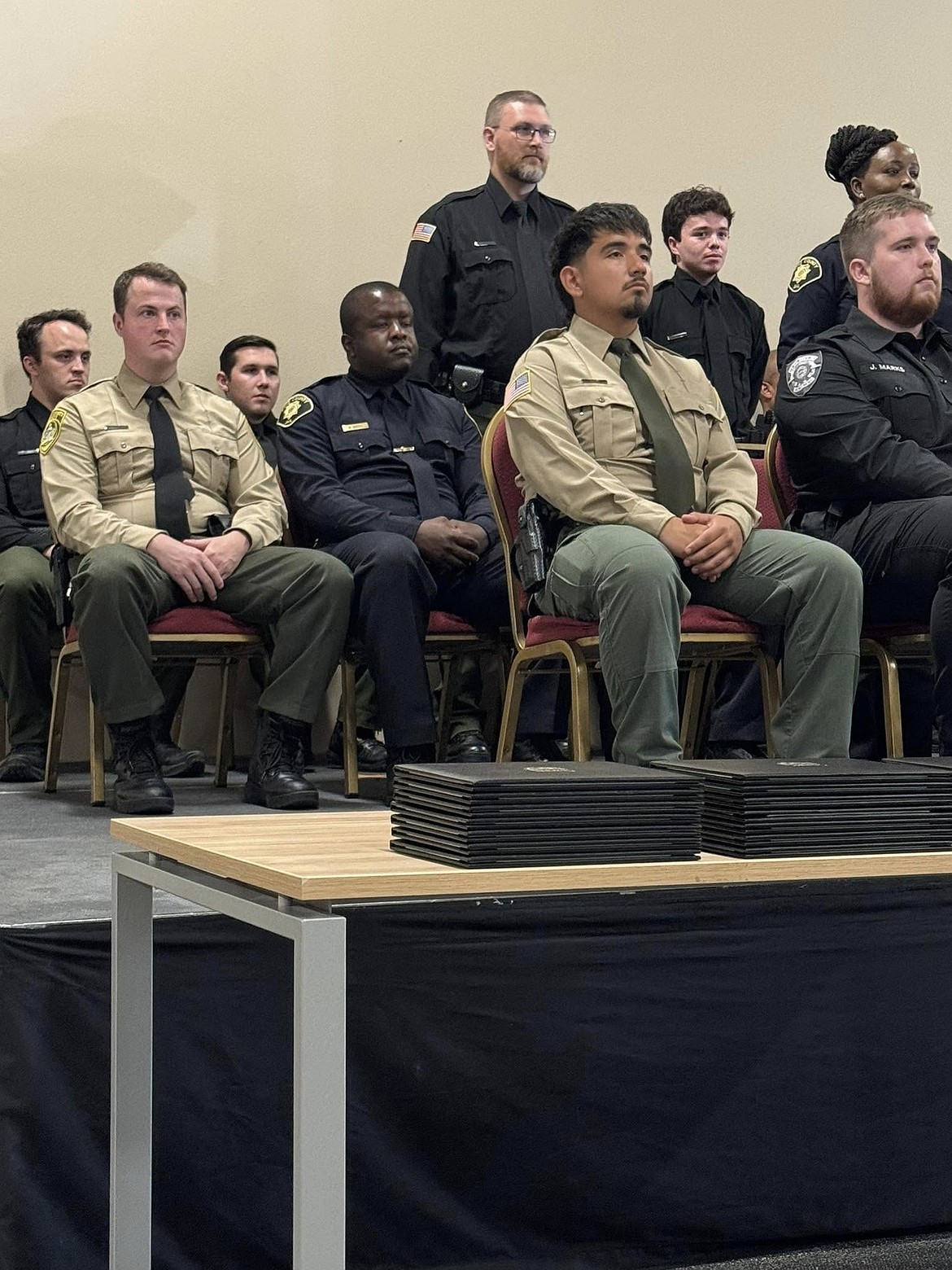 Adams County Sheriff’s corrections deputy Deigo Fraga, front row, graduated from the Corrections Officers Academy Monday.