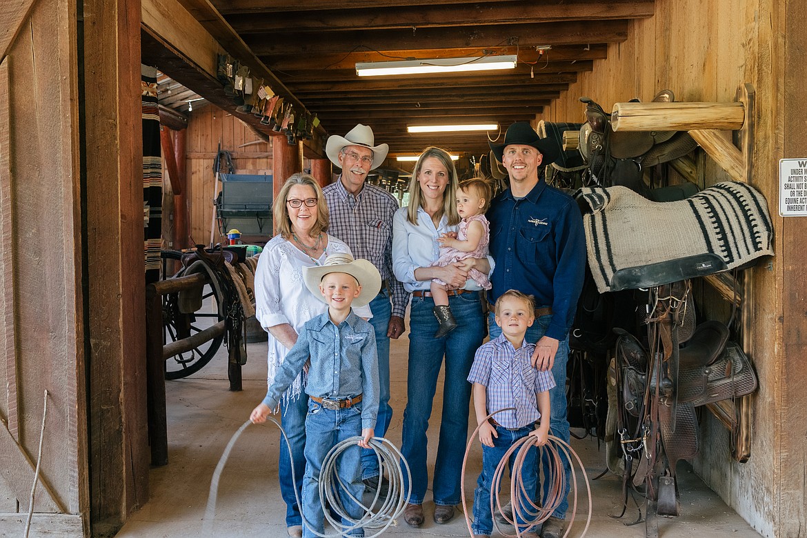 Flathead Lake Lodge owners Doug and Maureen Averill with their son and daughter-in-law, Chase and Kate, and their grandchildren. (photo provided)