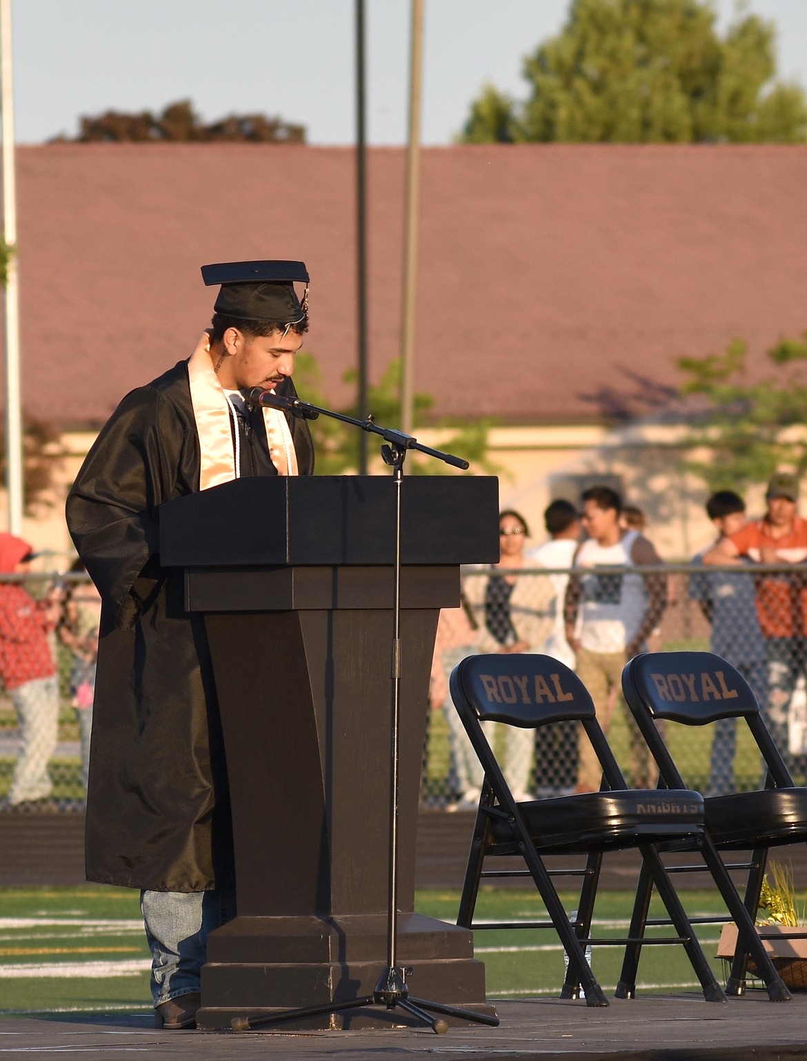 Student speaker David De La Rosa, Jr. addresses his classmates for the last time Friday at Royal High School’s graduation.