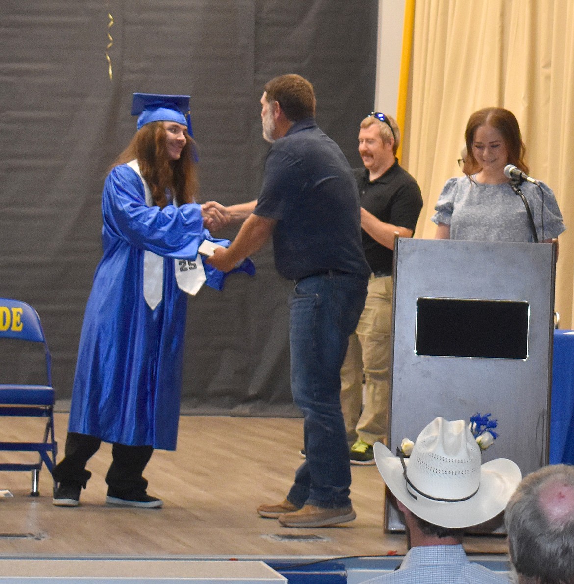 Wilson Creek High School Class of 2025 senior Chase Jarvis receives his diploma from School Board Member Brent Finkbeiner at graduation May 31.