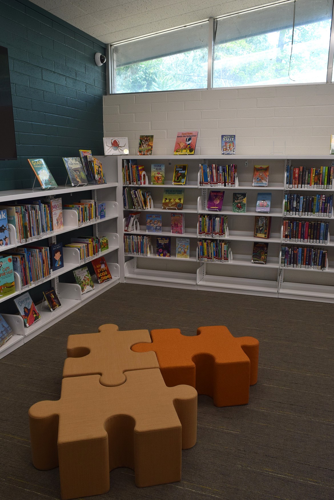 The Soap Lake library reorganized the layout with a family play section, pictured, added to the back corner. Half of the library includes another section for children and another for teens.