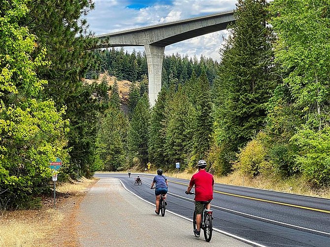 It’s no secret that North Idaho has become a hot spot for tourists to lay down their roots and embrace the rural lifestyle that the Gem State has to offer. Above, cyclists riding on a trail in the Coeur d'Alene area.