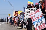 Thousands line US-95 in Coeur d'Alene for 'No Kings' protest, counter protest