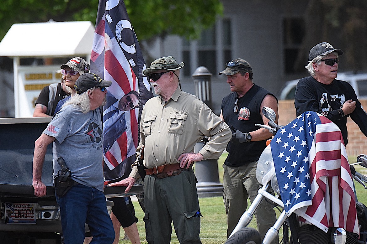 Some protesters were armed at the "No Kings" rally Saturday, June 14, 2025, in Libby. (Scott Shindledecker/The Western News)